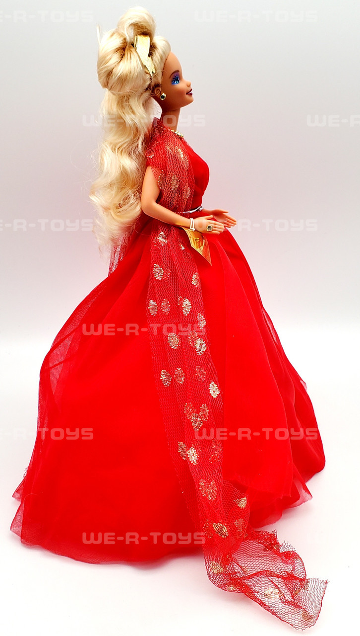 Barbie with short auburn hair,simple red dress. | Science Museum Group  Collection