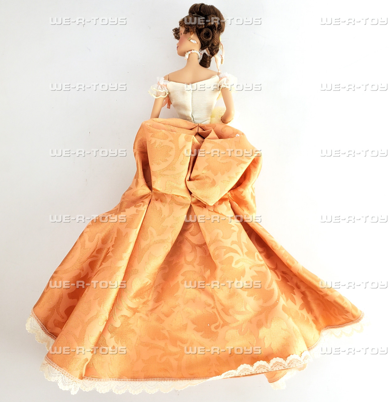 barbie with orange dress Orange dress Barbie fashionista she's here!! #182 Her hair was pushed back from the headband she came with! It's a little sparse in that spot as well to accommodate it. I