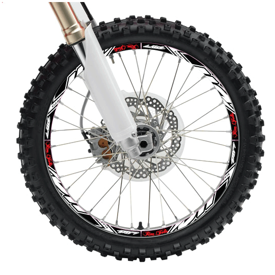 A dirt bike wheel with the rim covered in graphics.