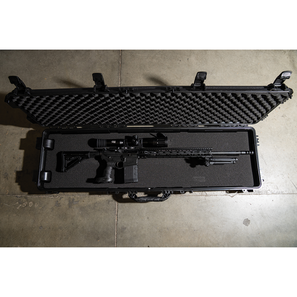 Rifle and accessories in hard case