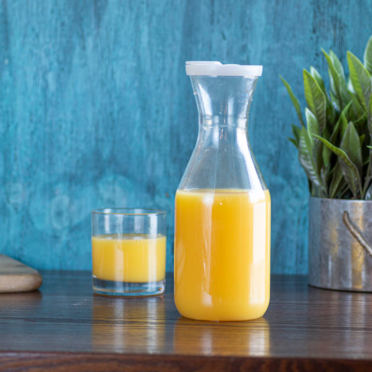 https://cdn11.bigcommerce.com/s-cznxq08r7/images/stencil/1280x1280/products/1184/8126/pdt-10-polycarbonate_juice_carafe_container_with_lid_-_1_liter-3__98003.1590771731.jpg?c=1