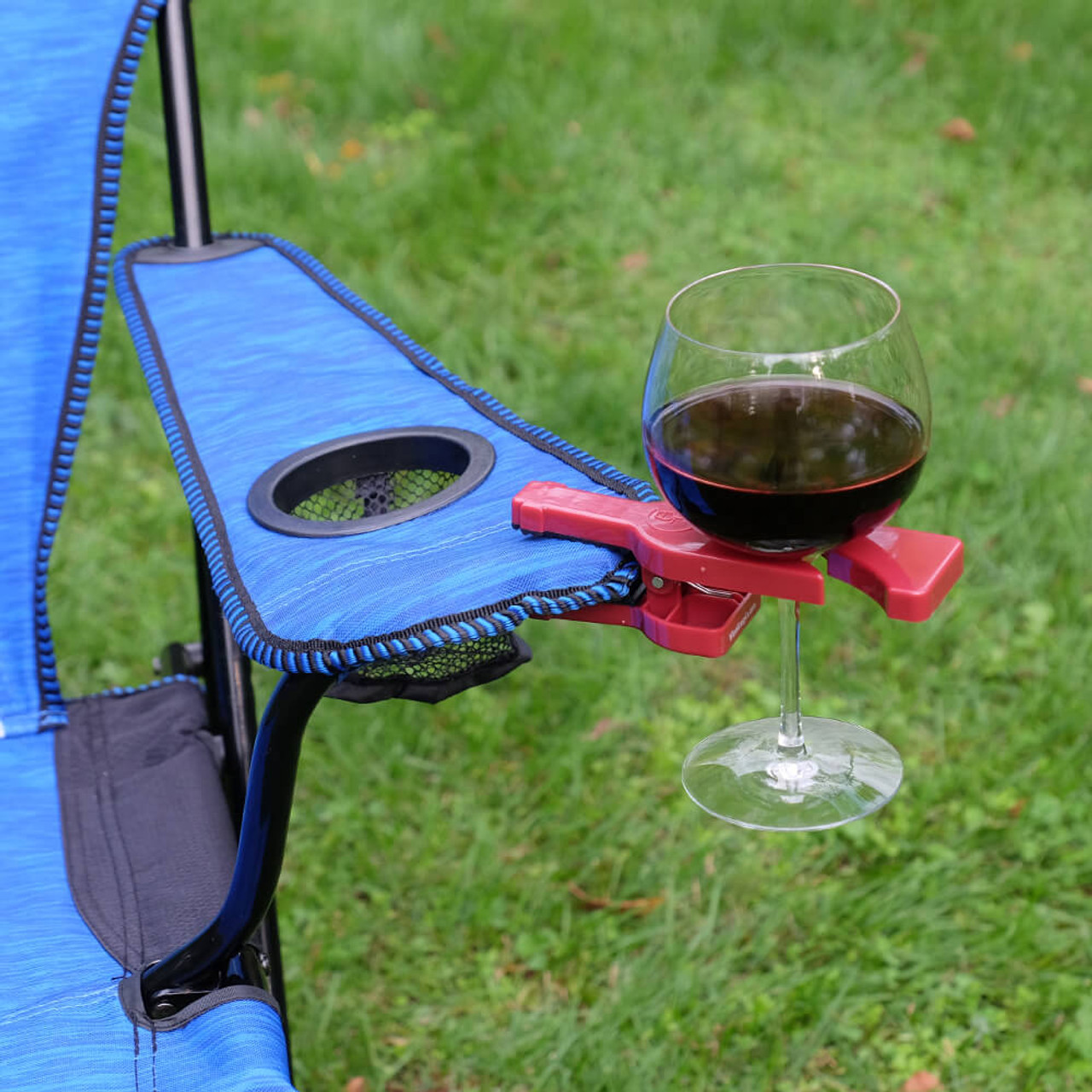 https://cdn11.bigcommerce.com/s-cznxq08r7/images/stencil/1280x1280/products/5048/13990/WG1-W24-WineGrasp-Stemware-Glass-Holder-Clamp-Attach-To-Outdoor-Chairs-For-Wine-Martini-and-Champagne-Glasses-002__34486.1638983075.jpg?c=1
