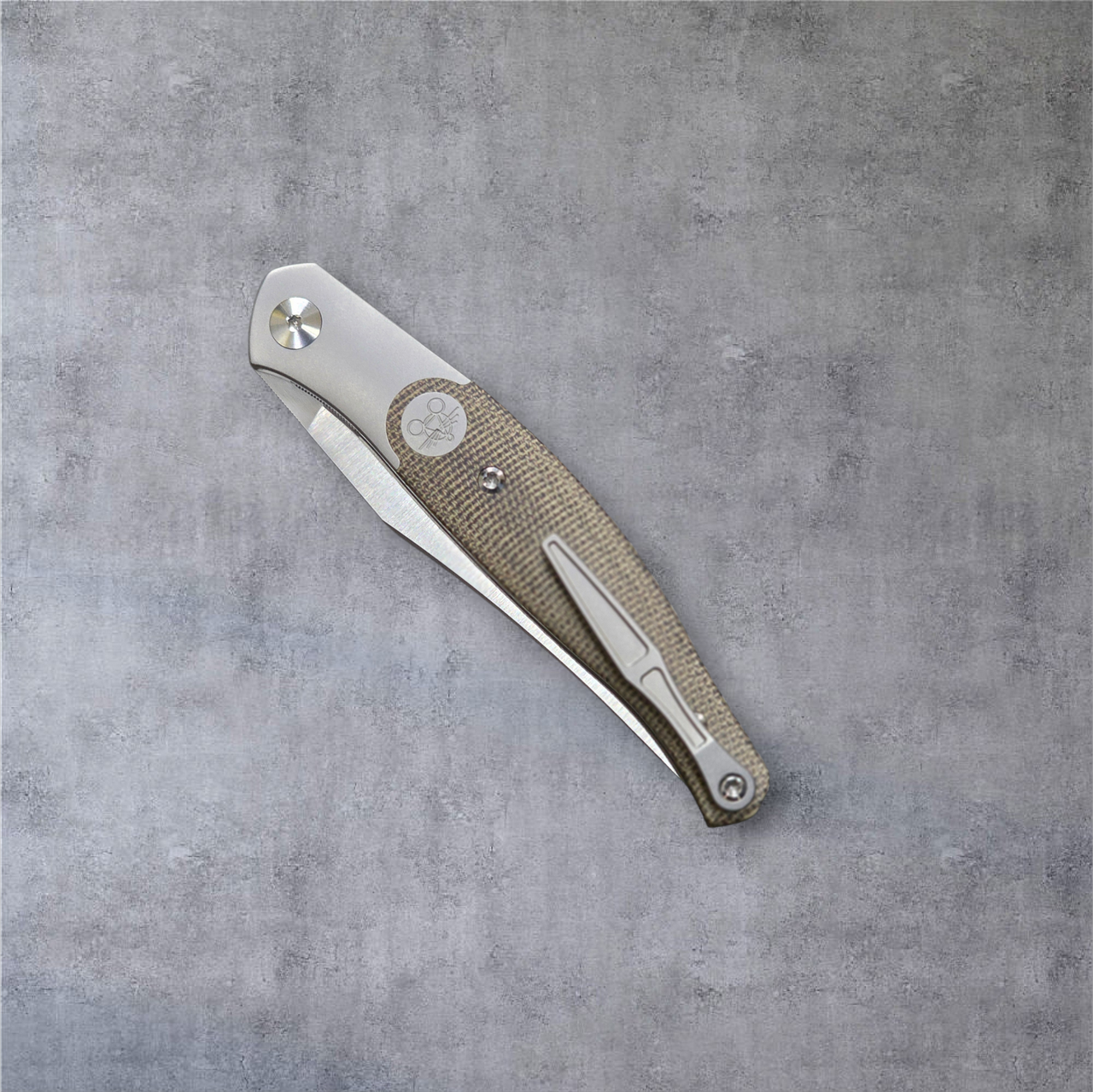 Previously Owned Giant Mouse GM7-M390 & Gorgeous Green Canvas Micarta 