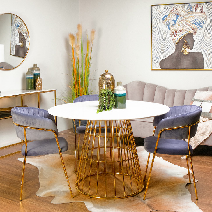 round dining table with white chairs