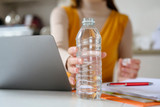 ​Bottled water drinkers ingest twice as many microplastics