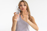 ​Bottled water drinkers ingest twice as many microplastics