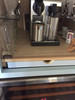 hidden coffee pod drawer 