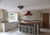 kitchen with kitchen island and stools