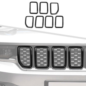 Five black ABS front grille insert trim pieces for 2021-2024 Jeep Grand Cherokee laid out flat showing numbered backs