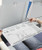 10-Pack Dinosaur Coloring Airplane Tray Table Covers 18x14 for Kids & Toddlers