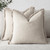 Set of 2 beige linen fringe tassel throw pillow covers 20x20 inches with boho farmhouse style on a sofa