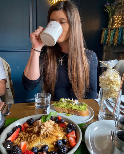 Young Woman wearing the Women's Flag Cross Necklace-Proverbs 30:5
