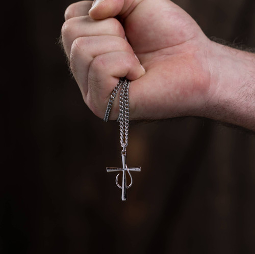 Men's Matthew 4:19 Fish Hook Necklace, engraved with "Fishers of Men" scripture, shown on a chain.-Hand holding Necklace Lifestyle Image