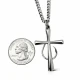Fish Hook Cross Necklace shown beside a U.S. quarter for size reference.