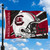 University Of South Carolina Gamecocks Collegiate Football Helmet Flag - Outdoors - Displayed flying from a black color flag pole.