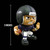 Baltimore Ravens Football Figure on a Black background with a line schematic showing the figures 3 inch size