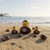 Texas A&M Aggies Collegiate Football Toy Rubber Duck 3 Pack Set - Displayed on a sandy beach near the ocean