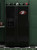 Philadelphia Eagles NFL Football Shaped Logo Magnet - Displayed on a black refrigerator in a green and black football themed kitchen