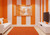 Tennessee Volunteers NCAA 3' x 5' Orange Checkered Flag - Logo & Wordmark - Hanging on a wall Indoors in a Tennessee Orange and White Fan Cave