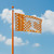 Tennessee Volunteers NCAA 3' x 5' Orange Checkered Flag - Logo & Wordmark - Flying outdoors on a Volunteers orange flag pole