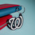 Washington Nationals Baseball Flex Rubber Logo Keychain - Displayed on a table next to a team colored wallet