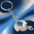 Tennessee Titans Football Helmet Keychain - Displayed on a team color gradient background