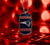 New England Patriots NFL Football Color Metal Tag Necklace - Embossed Logo and Wordmark - On Reflective red background