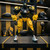 Pittsburgh Steelers Football 10 Inch Articulating Cleatus Robot Action Figure - Displayed standing on a shelf in a football themed room