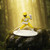 Yellow Ranger – Mighty Morphin Power Rangers Nano Metalfigs Mini Figure – 1.65" Die‑Cast Collectible - Displayed in a forest with yellow ambers in the background