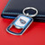 Tennessee Titans NFL Stainless Steel Bottle Opener Tag Keychain - On a Titans Red color table next to a blue wallet