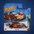 Mazda 787B - Hot Wheels Toy Vehicles - Retro Racers (2023) - HKJ79 - Displayed in retail short card packaging on a gradient blue background