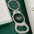 New York Jets NFL Green Bottle Opener Logo Keychain - On a Jets Green Table next to a white wallet and white purse