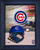 Chicago Cubs Baseball Logo Photo Print - Displayed in a blue wood frame