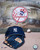 New York Yankees Baseball Photo - Displaying Top Hat, Cap & Glove on a Stadium Background