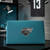 Jacksonville Jaguars NFL Chrome Emblem - Logo & Wordmark - On the back of a laptop
