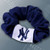 New York Yankees Baseball Blue & White Scrunchie Hair Twist Tie - Displayed on a gray baseball themed gradient background