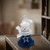 Dallas Cowboys Snowman Bell Ornament - Displayed sitting on a shelf