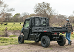 Rear view of the durable Can-Am Defender UTV bed organization system featuring the Deluxe Headache Rack.