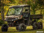 SuperATV 4 inch portal gear lift installed on Can-Am Defender HD10 6x6 showing increased ground clearance and larger tires SuperATV 4 inch portal gear lift installed on Can-Am Defender HD10 6x6 showing increased ground clearance and larger tires