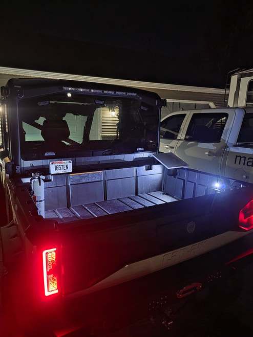 MCE MarqCad Can-Am Defender HD11 plug and play LED bed lights flush mounted in cargo box for nighttime visibility