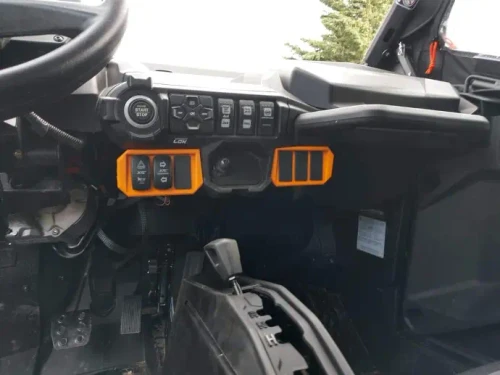 MCE Can-Am Commander G2 additional switch panel with three rocker switch mounting locations installed beside the factory ignition dash panel