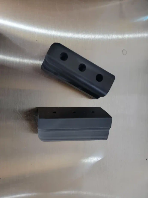 MCE Can-Am Defender bed slot wood divider attachment brackets installed on 2x4 or 2x6 lumber to create a removable cargo organizer and bed divider system.