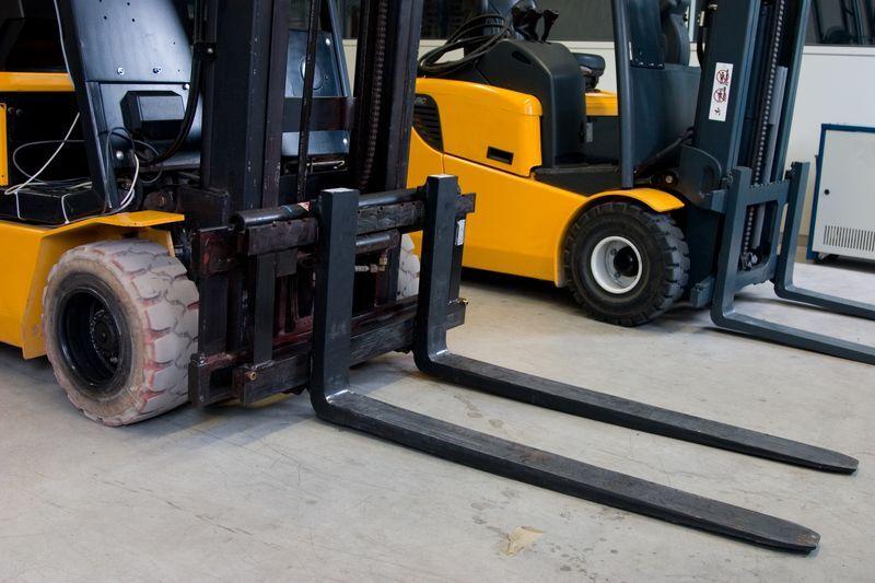 Forklift tires on white background showing different tire constructions