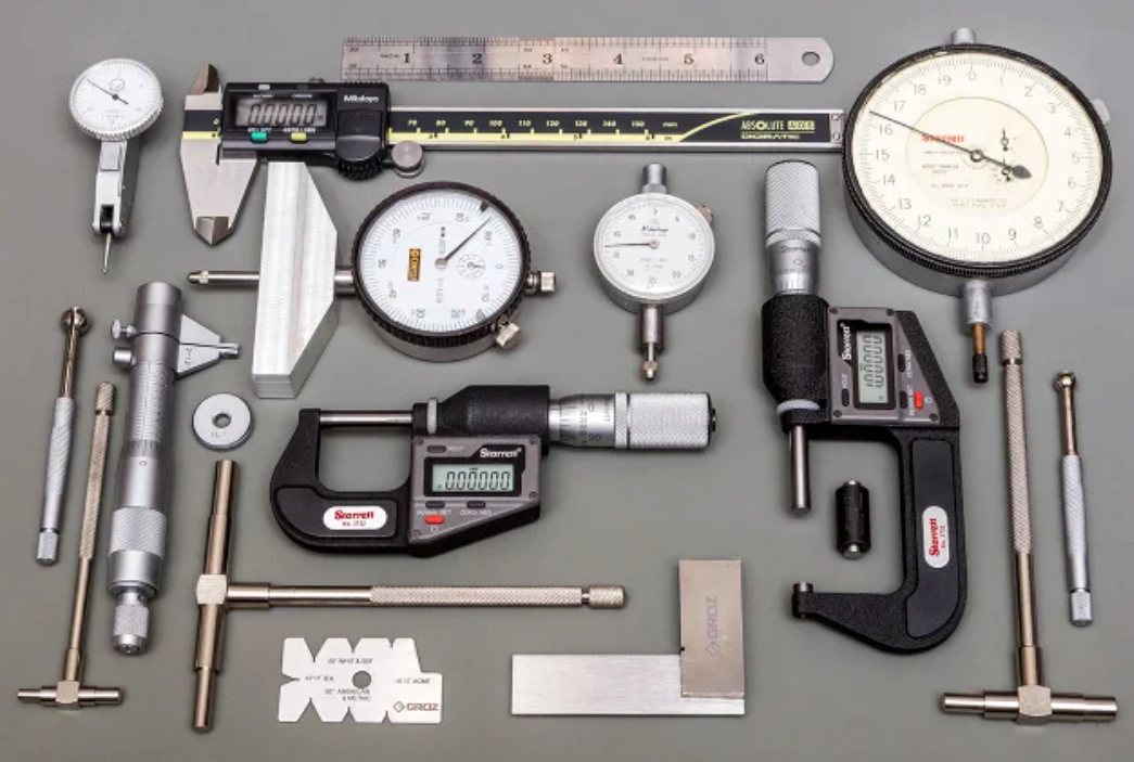 Micrometers, calipers, indicators and gauges on the inspection bench