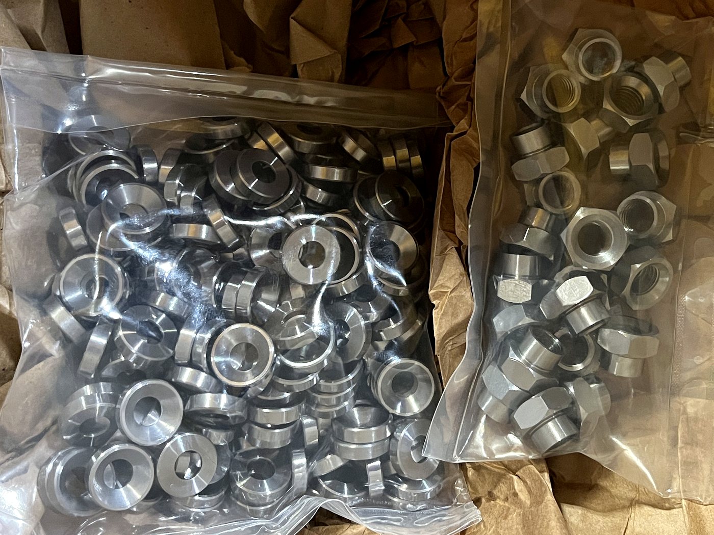 Finished machined parts bagged and boxed for shipping