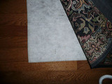 Teebaud Rug Pad on top of hard surface flooring