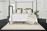 Momeni Beckton Taupe Area Rug in bedroom
