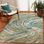 Capri 1764/04 Big Wave Aqua Indoor Outdoor Rug in seating area