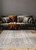 Couristan Hamadan Oman 6122/1001 Ivory Area Rug in modern living room setting