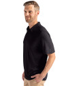 Side profile view of a man wearing a Black Cutter & Buck Coastline Epic Comfort Eco Recycled Mens Polo Thumbnail Image